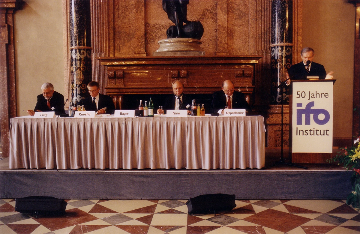 Podium at the 1999 Annual Meeting celebrating 50 years of ifo as is indicated on the banner at the podium.